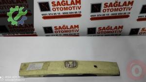 HONDA JAZZ ÇIKMA BAĞAJ KAPAĞ KAPLAMASI OEM; 77890-SAA-0030