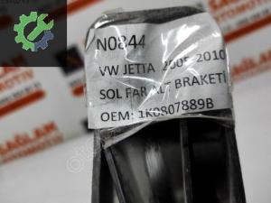 VW JETTA 05-10 ÇIKMA SOL FAR ALT BRAKETİ OEM; 1K0807889B