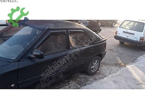 Mazda 323 Kapı çıkma parça