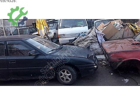 Mazda 323 Çamurluk çıkma parça