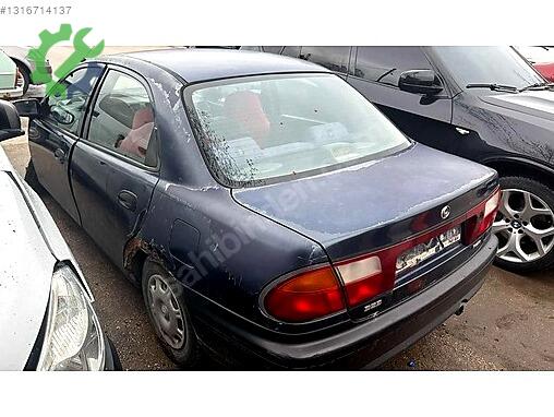 Mazda 323 Bagaj çıkma parça