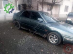 Mazda 323 hasarlı oto çıkma parça Mısırcıoğlu oto